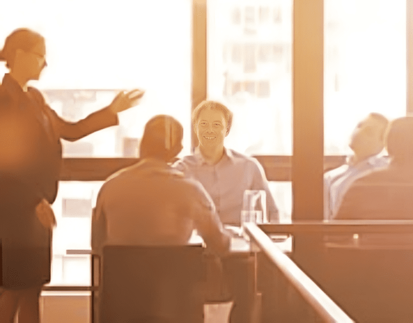 Business meeting in sunlit office